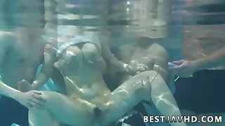 Suzuna Komiya&comma; the nastiest Asian woman&comma; gives fellatio apart from the pool in the greatest Japanese group fuck-a-thon scene&period;